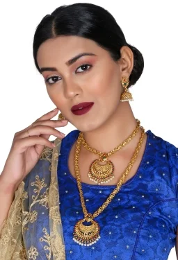 Alloy Jewel SetColor :Ruby Red, White, Gold, GreenColor Code :MaroonGreenModel Number :6128MGSales Package Id :2 Necklace, 1 Pair of earringsType :Earring & Necklace SetBase Material :AlloyPlating :Gold-plated7 Days Return Policy, No questions asked.