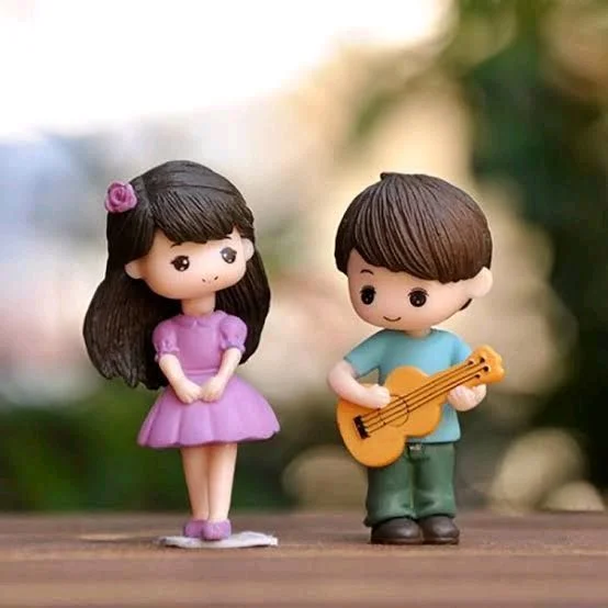 Miniature Guitar Boy With Girl