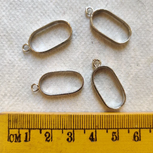 Oval Silver Open Bezel