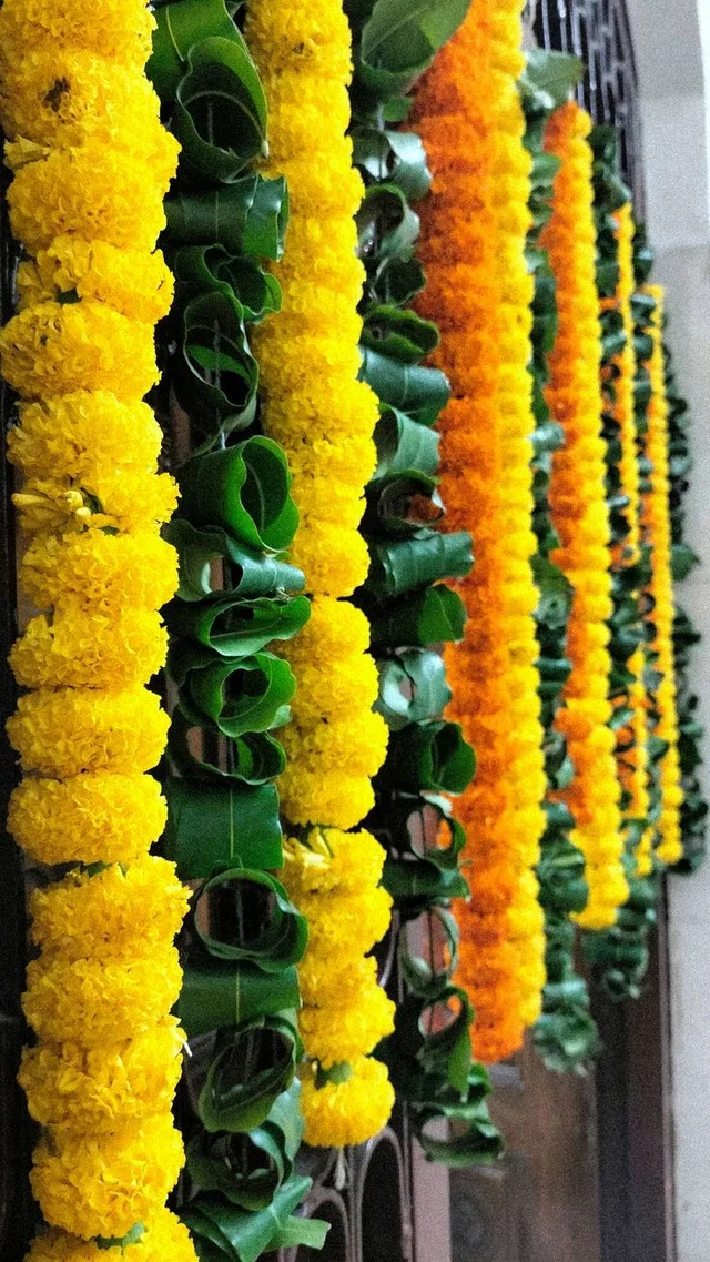 Yellow Marigold And Green Ashok Leafs String