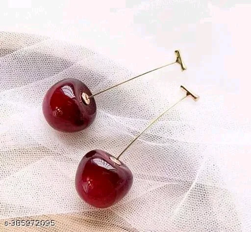 Fashinable PCENF5397 Western Korean Stylish beautiful Cherry Earings For Women And GirlsName: Fashinable Western Korean Stylish beautiful Cherry Earings For Women And GirlsBase Metal: AlloyPlating: Gold PlatedSizing: AdjustableStone Type: No StoneType: Drop EarringsNet Quantity (N): 1Fashionable cherry earrings are a delightful and trendy accessory 