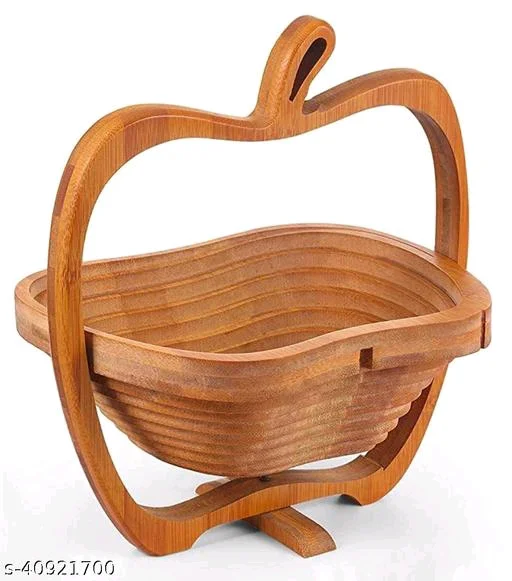 Wooden PCENF5405 Foldable Fruit & Vegetable BaketName: Wooden Foldable Fruit & Vegetable BaketMaterial: WoodenType: Kitchen StorageLid Type: Without LidColor: BrownNo. of Compartments: 1Product Length: 29 cmProduct Height: 18 cmProduct Breadth: 26 cmNet Quantity (N): 1Wooden Fruit & Vegetable Basket is Foldable and is made of high quality wood Completely finished product. 
