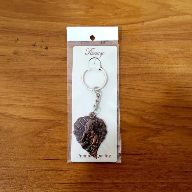 Bal Krishna Antique Bronze Keychain – Spiritual & Durable