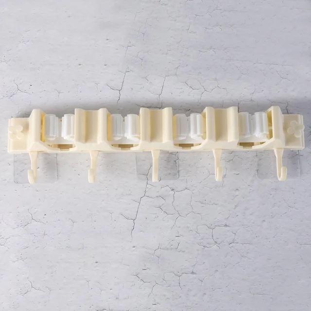 Broom & Mop Holder – Self-Adhesive Wall-Mount Organizer