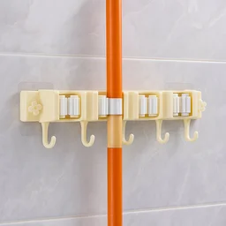 Broom & Mop Holder – Self-Adhesive Wall-Mount Organizer
