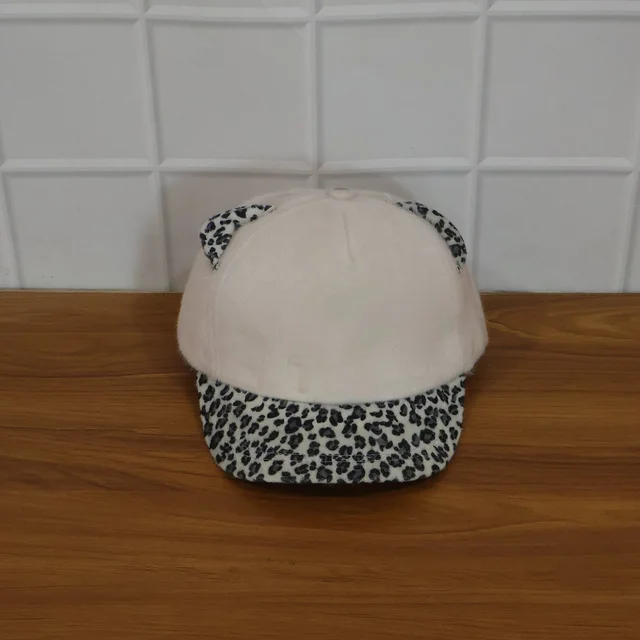 Cat Ear Fur Cap – Trendy Winter Headwear with Printed Visor