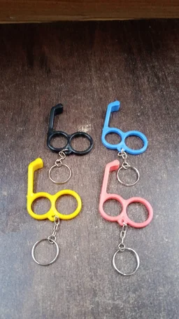 Dual-Finger Mobile Stand Keyring – Lightweight 2-in-1 Phone Holder