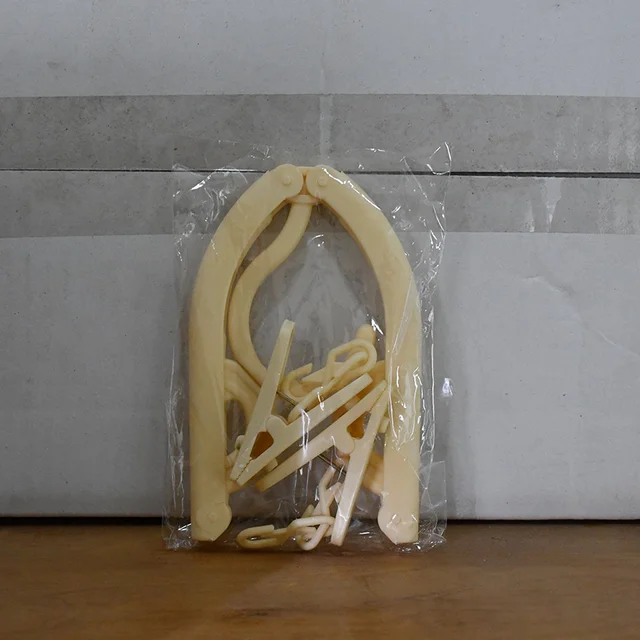 Foldable Cloth Hanger with Dual Clips – Space-Saving Laundry Organizer