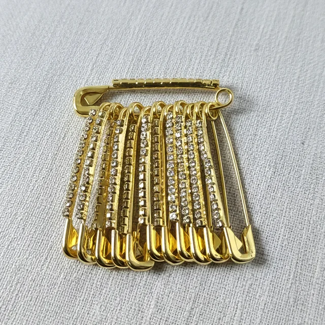 Golden Safety Pin Brooch Set – Elegant Stone-Embedded Design
