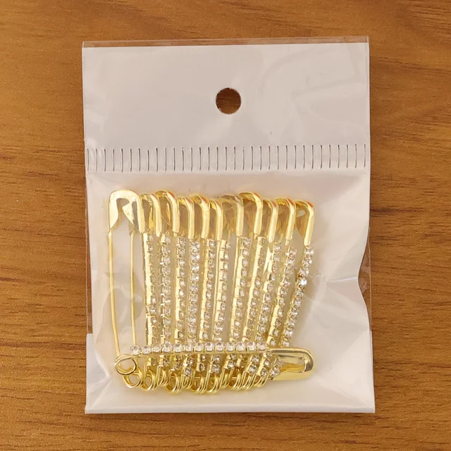 Golden Safety Pin Brooch Set – Elegant Stone-Embedded Design