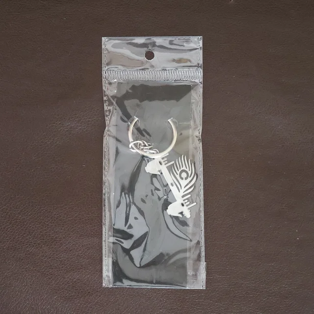Krishna Flute Keychain – Devotional Metal Keyring for Spirituality