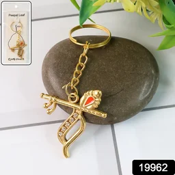 Krishna Metal Keychain – Durable Flute & Peacock Feather Design
