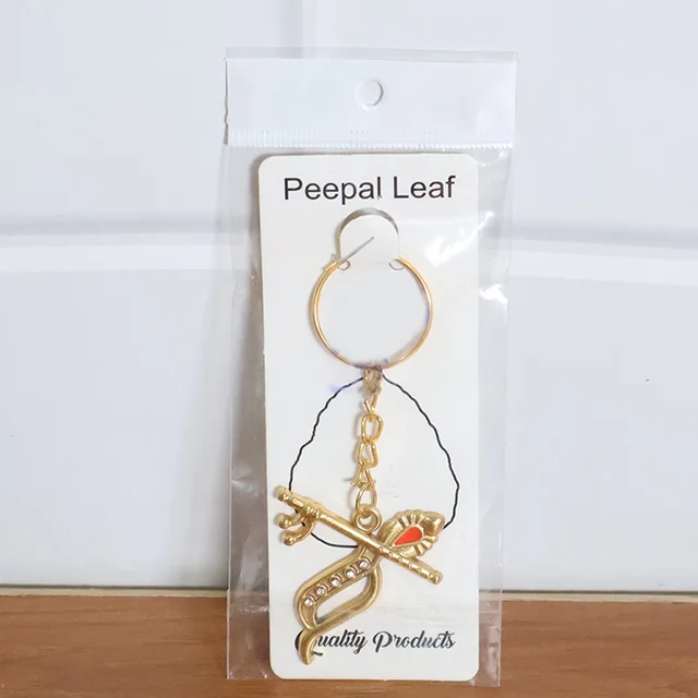 Krishna Metal Keychain – Durable Flute & Peacock Feather Design