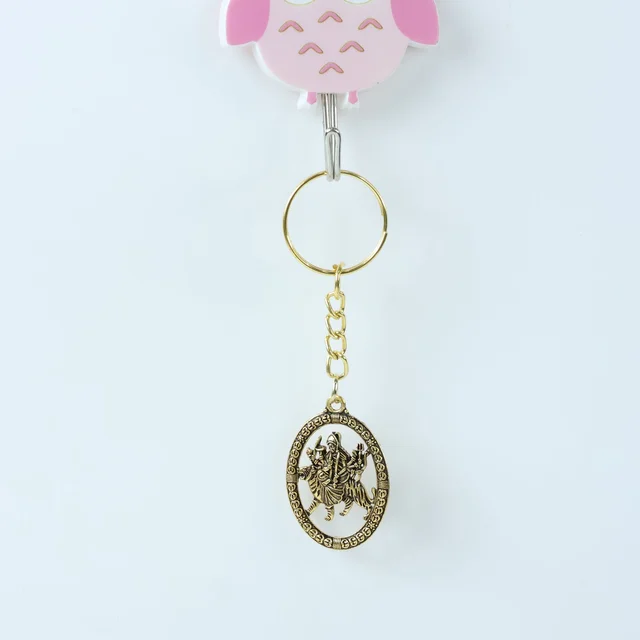 Maa Durga Golden Oval Frame Keychain – Spiritual Protection