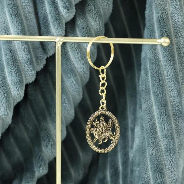 Maa Durga Golden Oval Frame Keychain – Spiritual Protection