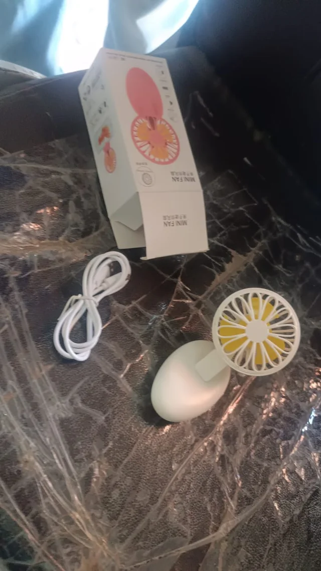 Mini USB Handheld Fan – Portable & Rechargeable Cooling | VoltDesk