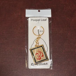 Om Trishul Keychain – Durable Golden Metal Accessory