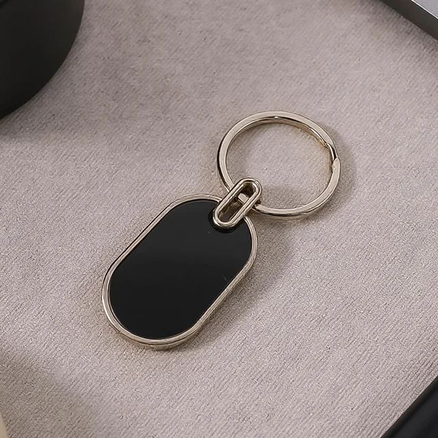 Oval Metal Keychain – Elegant Black & Silver Finish for Everyday Use