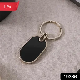 Oval Metal Keychain – Elegant Black & Silver Finish for Everyday Use