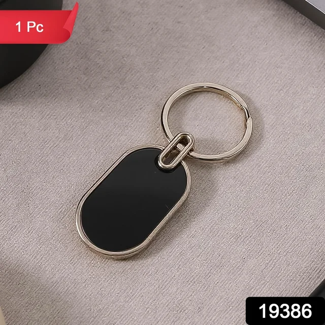 Oval Metal Keychain – Elegant Black & Silver Finish for Everyday Use