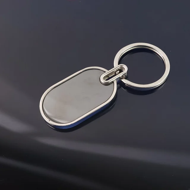 Oval Metal Keychain – Elegant Black & Silver Finish for Everyday Use