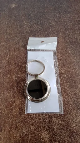 Round Metal Keychain – Durable Chrome Finish with Black Center