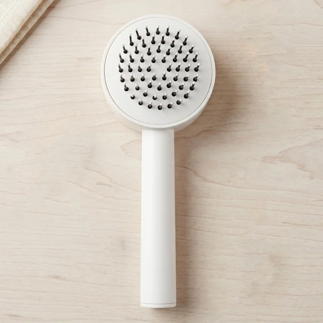 Self-Cleaning Hair Brush – Detangle & Massage | Velvet Wheels