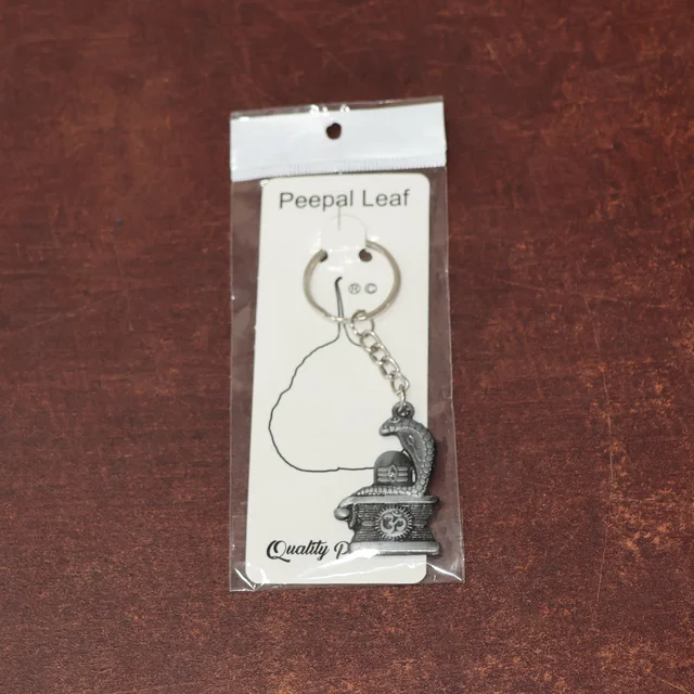 Shivling Keychain – Elegant Silver Metal Design with Snake Motif