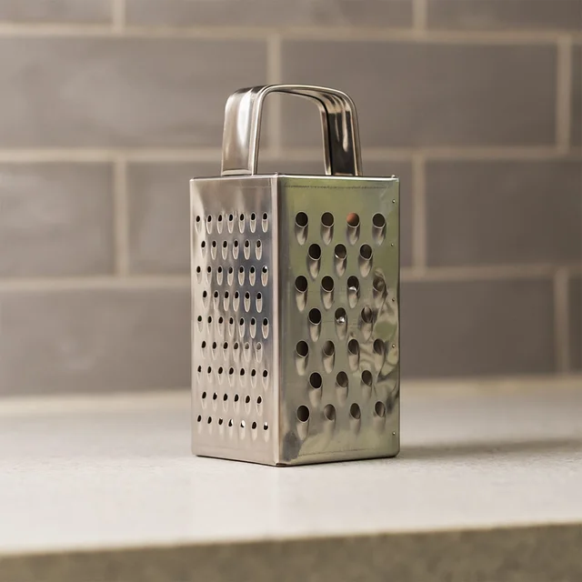 Stainless Steel 4-in-1 Compact Grater & Slicer – Durable Kitchen Tool