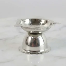 Sunflower Design Stainless Steel Diya Stand – Small Durable Pooja Lamp