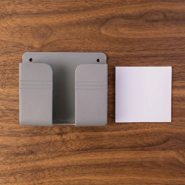 Wall-Mounted Mobile & Remote Holder – Space-Saving Organizer