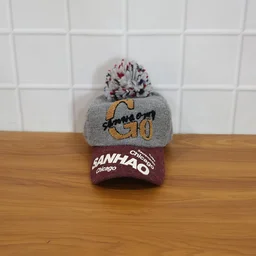 Women's Winter Woolen Baseball Cap – Cozy Pom Pom & Sun Protection