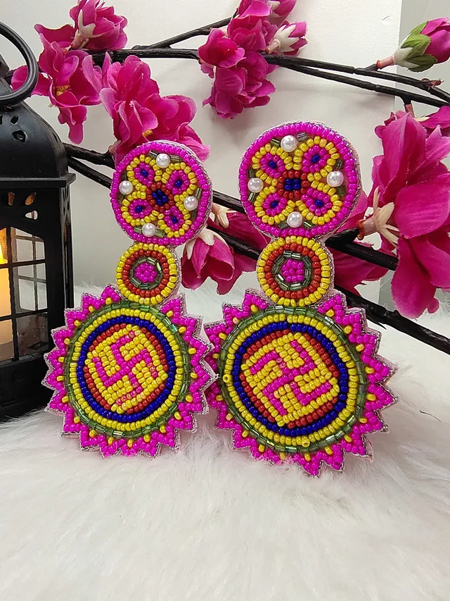 Pink Swastik Beaded Earrings