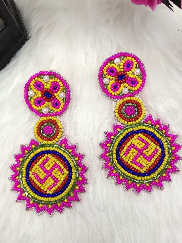 Pink Swastik Beaded Earrings