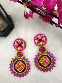 Pink Swastik Beaded Earrings