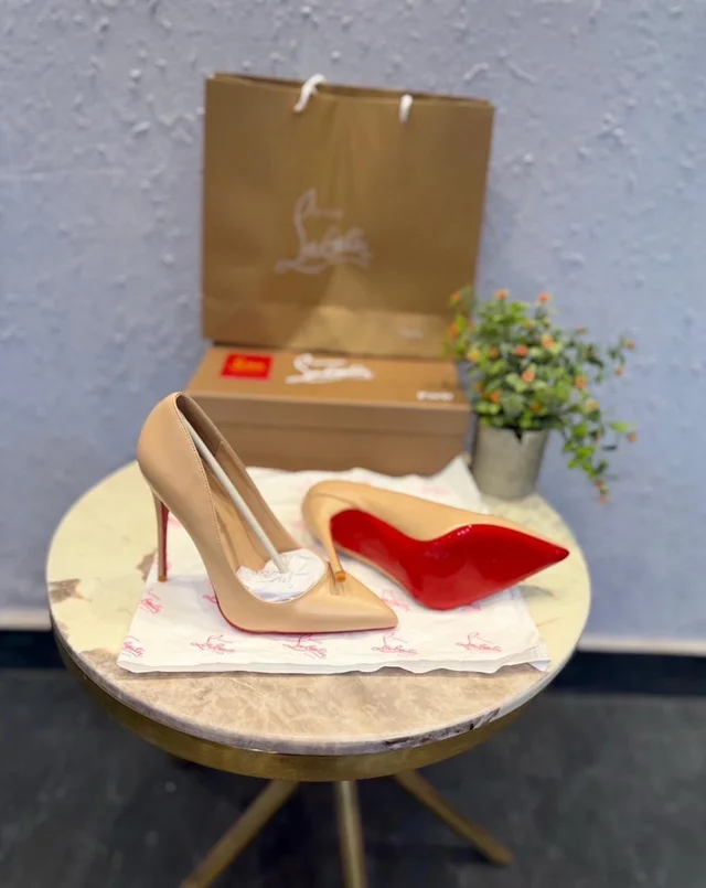 CHRISTIAN LOUBOUTIN RED SOLE LEATHER HEELS 