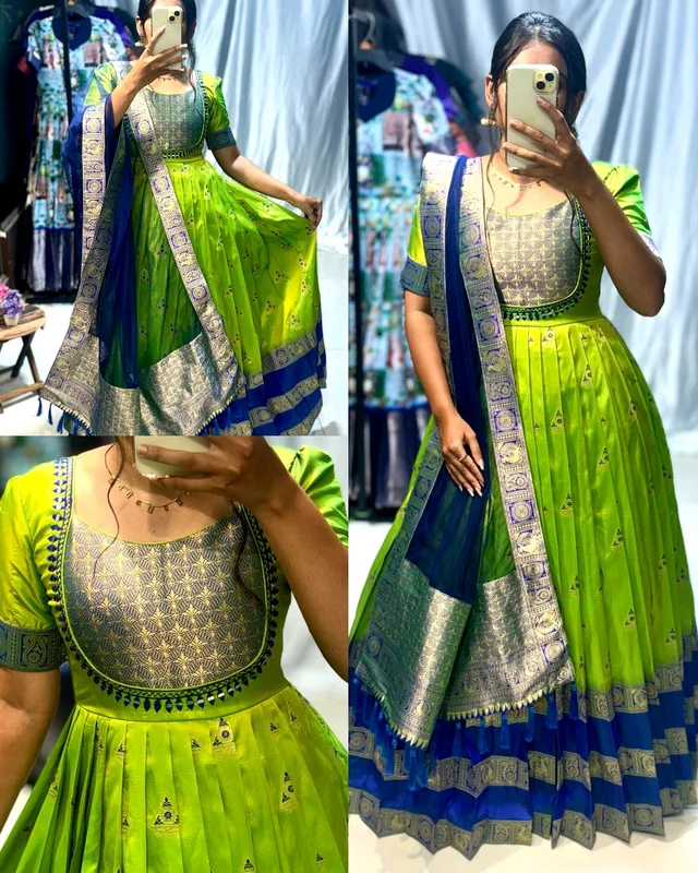 Trendy silk gown, crafted with banarasi silk and golden zari weave.paired with net duppta with zari border and decorated with mirror and work - M
