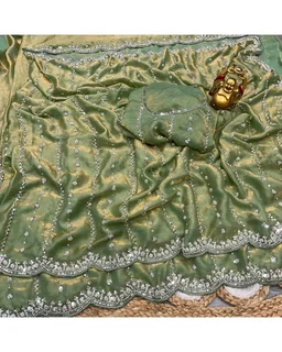 High Trending Presenting you the luxurious and glamorous hand work saree
- Free Size, Green