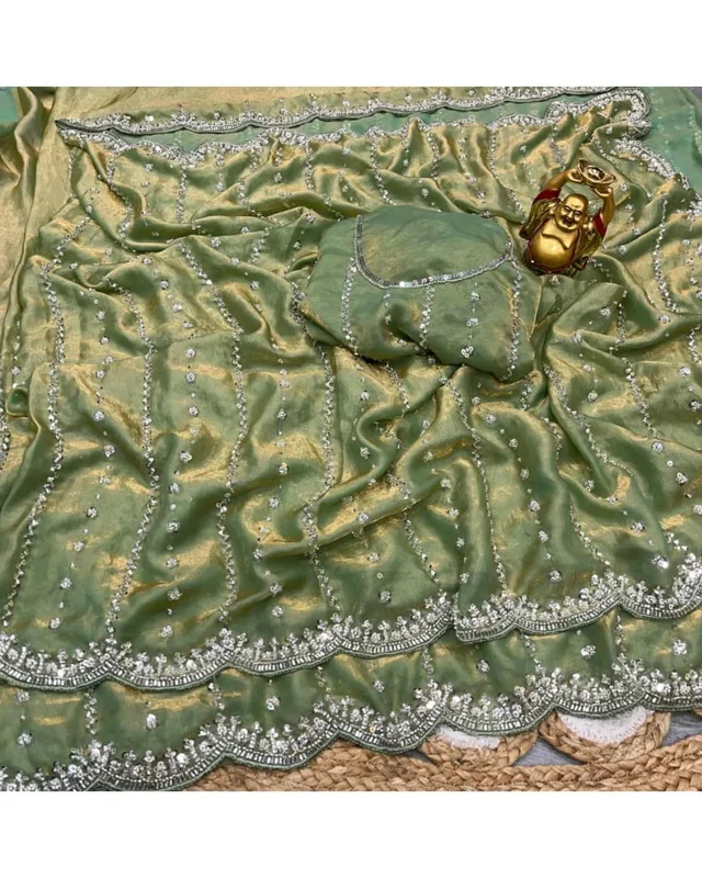 High Trending Presenting you the luxurious and glamorous hand work saree
- Free Size, Green