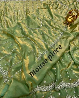 High Trending Presenting you the luxurious and glamorous hand work saree
- Free Size, Green