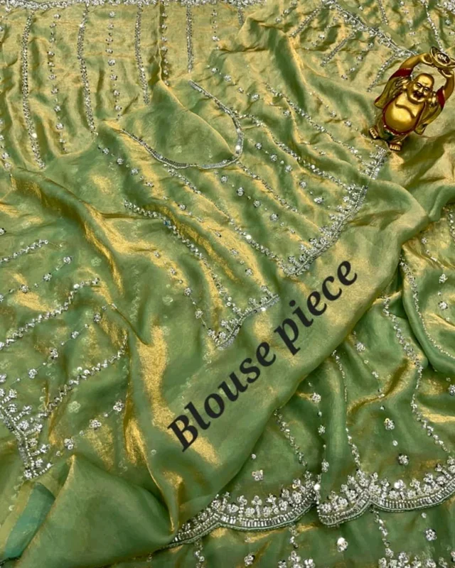 High Trending Presenting you the luxurious and glamorous hand work saree
- Green, Free Size
