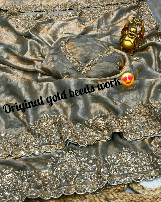Launch Grand party wear saree in original gold beeds work - Free Size