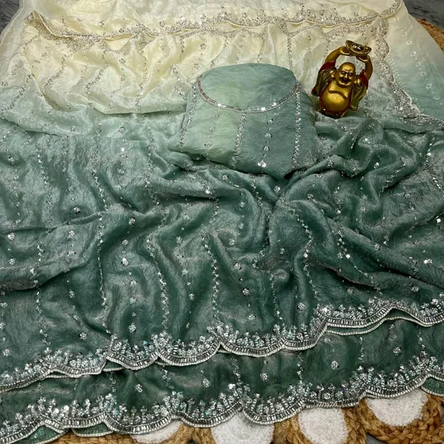 High Trending Presenting you the luxurious and glamorous hand work saree - Teal, Free Size