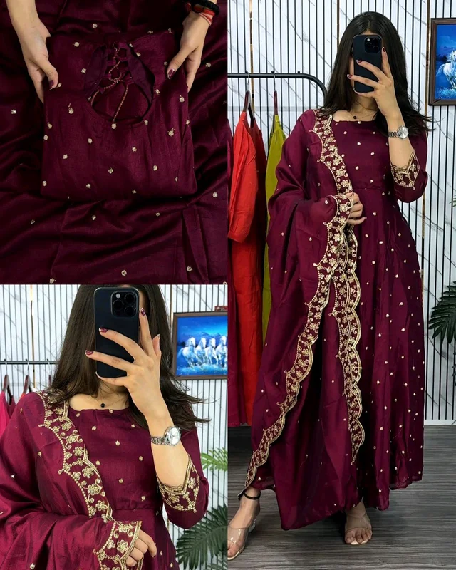 Introducing our Striking Vichitra Anarkali Adorned with Exquisite Embroidery. Paired with a delicate Border dupatta, this ensemble exudes elegance and sophistication, perfect for any special occasion - Burgundy, 2XL