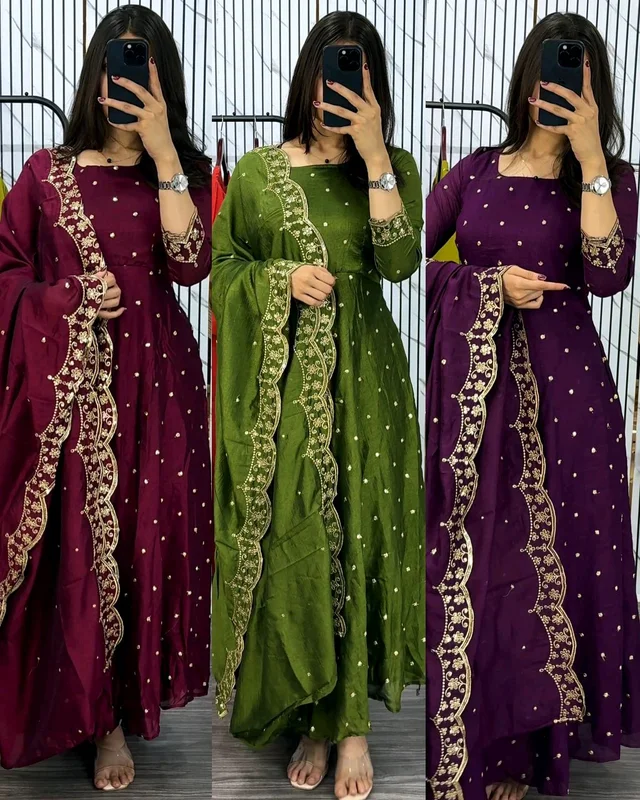 Introducing our Striking Vichitra Anarkali Adorned with Exquisite Embroidery. Paired with a delicate Border dupatta, this ensemble exudes elegance and sophistication, perfect for any special occasion - Green, M