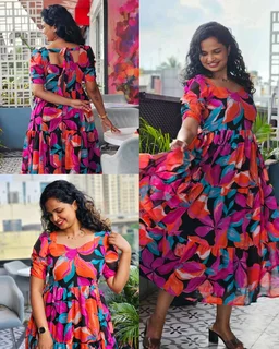 Introducing our latest essential: the Floral Dress. Crafted for comfort, this easy-breezy dress features a delightful floral print. With a charming neck detail and playful frill at the flare, it’s perfect for sunny days. - Mandy, S