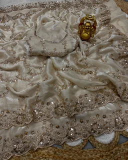 Launch Grand party wear saree in original gold beeds work