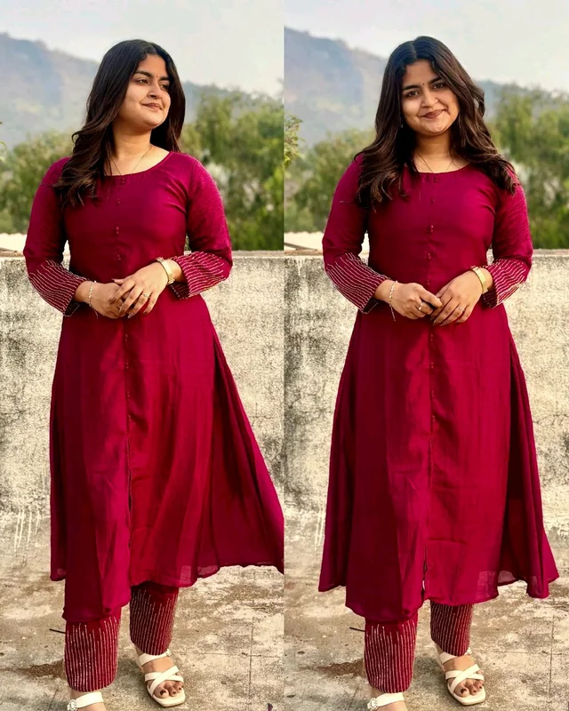 Crafted in luxurious blooming this elegant A-line kurta set is adorned with beautiful sleeve and pant handwork this work highlight rich look of the outfit
- 2XL, Maroon