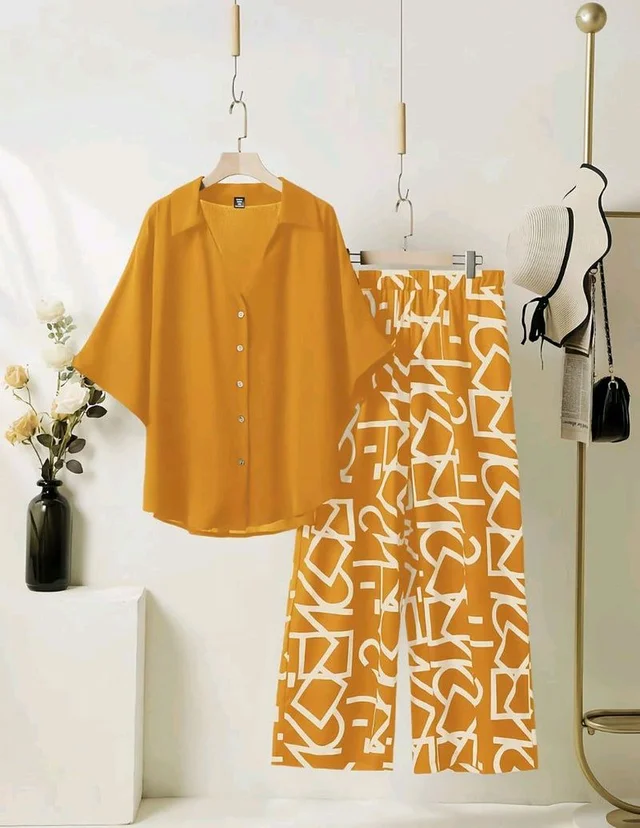 ELEGANT PINE GREEN TOP WITH GRAPHIC PALAZZO SET - Brandy Punch, L