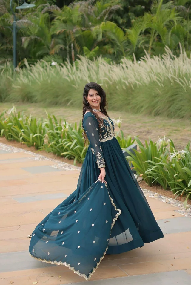 Beautiful Aqua Blue Color Zari Embroidered Work Gown
- Big Stone, M